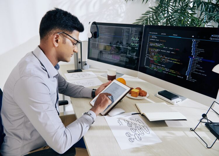 Software developer checking mindmap