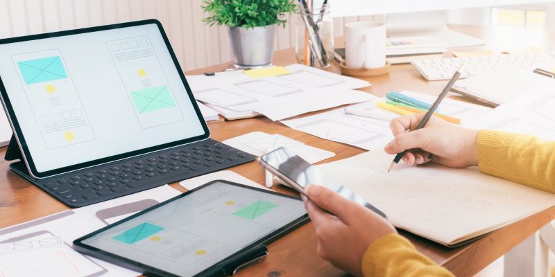 Computer software developer designing user interface.