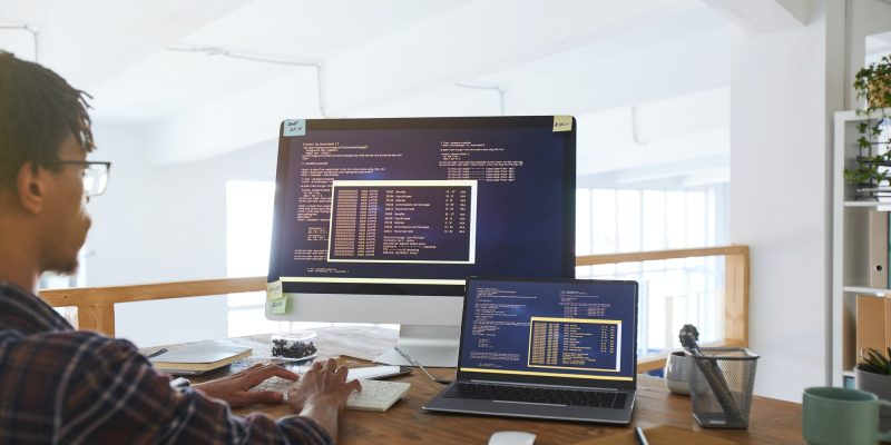 Young IT Developer at Workplace