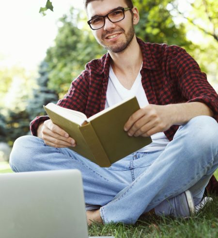 Young student preparing for exams outdoors